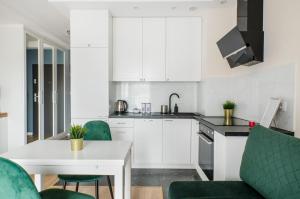 Kjøkken eller kjøkkenkrok på ApartHouse Deluxe