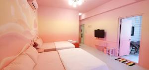 Letto o letti in una camera di 清清之家 DingDing Home