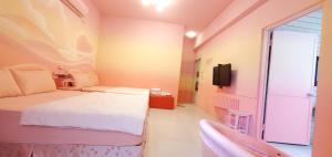 Letto o letti in una camera di 清清之家 DingDing Home