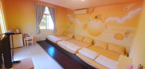 Letto o letti in una camera di 清清之家 DingDing Home