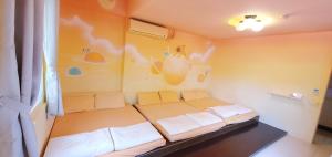 Letto o letti in una camera di 清清之家 DingDing Home