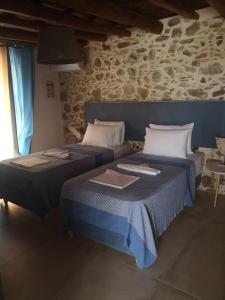 A bed or beds in a room at Harmony Family house