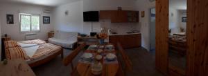 Postel nebo postele na pokoji v ubytování Apartments Ksenija