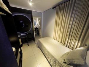 Postel nebo postele na pokoji v ubytování Castro's Hotel