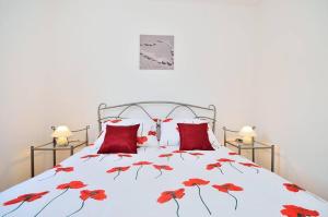 Postel nebo postele na pokoji v ubytování Apartments Nautilus