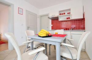 Kuchyň nebo kuchyňský kout v ubytování Apartments Nautilus