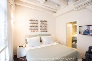 Letto o letti in una camera di Hotel 'T Sandt