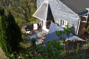 an aerial view of a house with a patio at La Maison de la Rose in Étretat