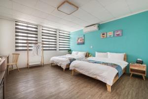 Voodi või voodid majutusasutuse Hibnb Guesthouse toas