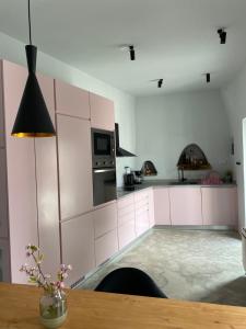 Kuchyň nebo kuchyňský kout v ubytování Fourfouras Cottage