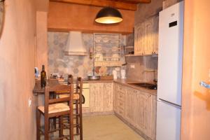 Kuchyň nebo kuchyňský kout v ubytování APIGANOS house