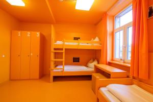 Ein Bett oder Betten in einem Zimmer der Unterkunft Jugendherberge Oberammergau
