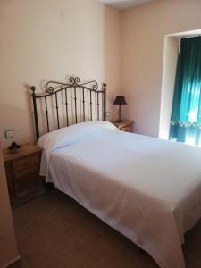 Postel nebo postele na pokoji v ubytování Casa Rural el Picozo + 24 fotografií