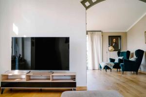 TV a/nebo společenská místnost v ubytování Ferienwohnung Radeberg