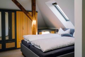 Postel nebo postele na pokoji v ubytování Ferienwohnung Radeberg
