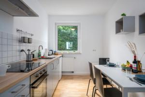 Kuchyň nebo kuchyňský kout v ubytování CASSEL LOFTS - Gehobene Monteurwohnung für 4 - nähe Uni, Klinikum, Industriepark Mittelfeld