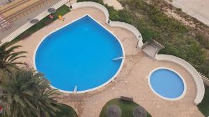 Basen w obiekcie Apartamento en primera linea en la Playa de San Juan lub w pobliżu