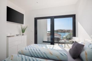 Μια τηλεόραση ή/και κέντρο ψυχαγωγίας στο Villa Ocean View I Zatoglav