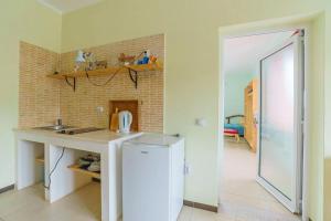 Kuchyň nebo kuchyňský kout v ubytování Yoga & Apartment Zlata Oliva