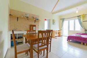 Postel nebo postele na pokoji v ubytování Yoga & Apartment Zlata Oliva