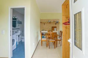 Kuchyň nebo kuchyňský kout v ubytování Yoga & Apartment Zlata Oliva