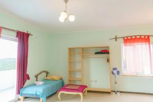 Postel nebo postele na pokoji v ubytování Yoga & Apartment Zlata Oliva
