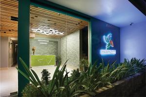 Vrt pred nastanitvijo Felicity Island Hotel