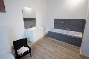 Koupelna v ubytování Luxury Spa Hotel - Francofolies