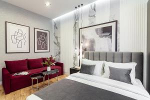 Posteľ alebo postele v izbe v ubytovaní Lovely apartment on Drahomanova street