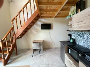 Kuchyň nebo kuchyňský kout v ubytování SMAG Suites