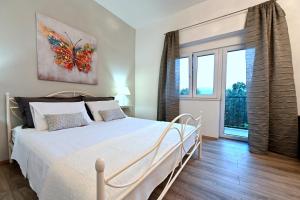 Postel nebo postele na pokoji v ubytování Studio apartman Sandra, Imotski