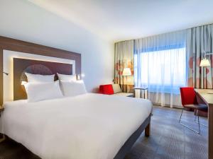 Posteľ alebo postele v izbe v ubytovaní Novotel Katowice Centrum