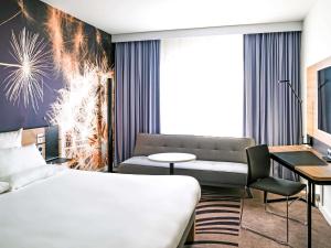 Posteľ alebo postele v izbe v ubytovaní Novotel Katowice Centrum