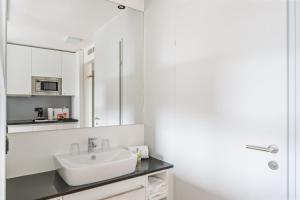 Ein Badezimmer in der Unterkunft smartments Wien Heiligenstadt