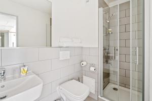 Ein Badezimmer in der Unterkunft smartments Wien Heiligenstadt