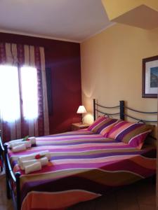 Cama o camas de una habitación en Casevacanze Sanvito