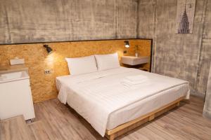 A bed or beds in a room at Tainanwow