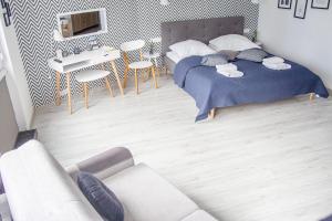 Posteľ alebo postele v izbe v ubytovaní Al-Dom Apartament 112 Awangardia, 300 m do plaży w dzielnicy uzdrowiskowej