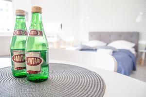 Nápoje v ubytovaní Al-Dom Apartament 112 Awangardia, 300 m do plaży w dzielnicy uzdrowiskowej