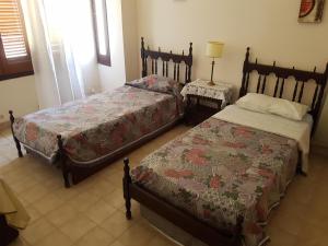 En eller flere senge i et værelse på Casa Esquina - Barrio Palermo - Zona Anfiteatro