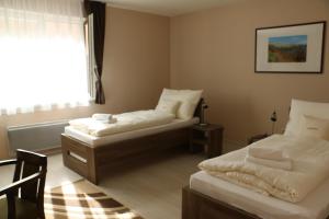 Postel nebo postele na pokoji v ubytování Wellness Simply Relax - Chopok- privátna vírivka, sauna + 37 fotografií