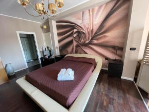 Postel nebo postele na pokoji v ubytování CconfortHotels R&B Cavour
