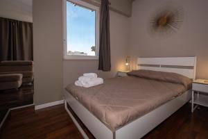 Postel nebo postele na pokoji v ubytování CconfortHotels R&B Cavour