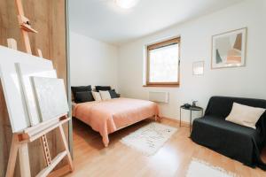 Posteľ alebo postele v izbe v ubytovaní Holiday house Liptovský Ján