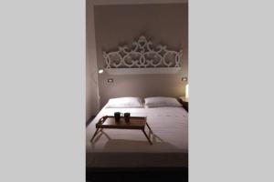 A bed or beds in a room at La Magnolia