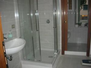 a bathroom with a shower and a sink at La Risorgente B&B in Rome