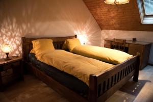 Ένα ή περισσότερα κρεβάτια σε δωμάτιο στο La Légende