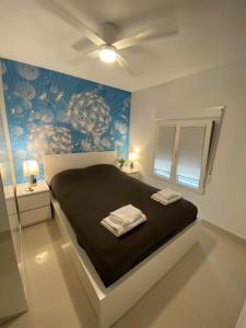 Ein Bett oder Betten in einem Zimmer der Unterkunft Calle San Carlos 132