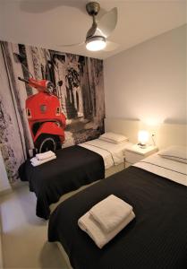 Ein Bett oder Betten in einem Zimmer der Unterkunft Calle San Carlos 132