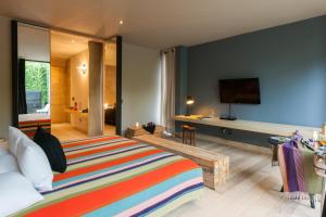 TV a/nebo společenská místnost v ubytování Hotel Bo